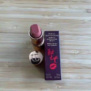 Charlotte Tilbury Matte Revolution lipstick in Super Cindy.  BNIB
